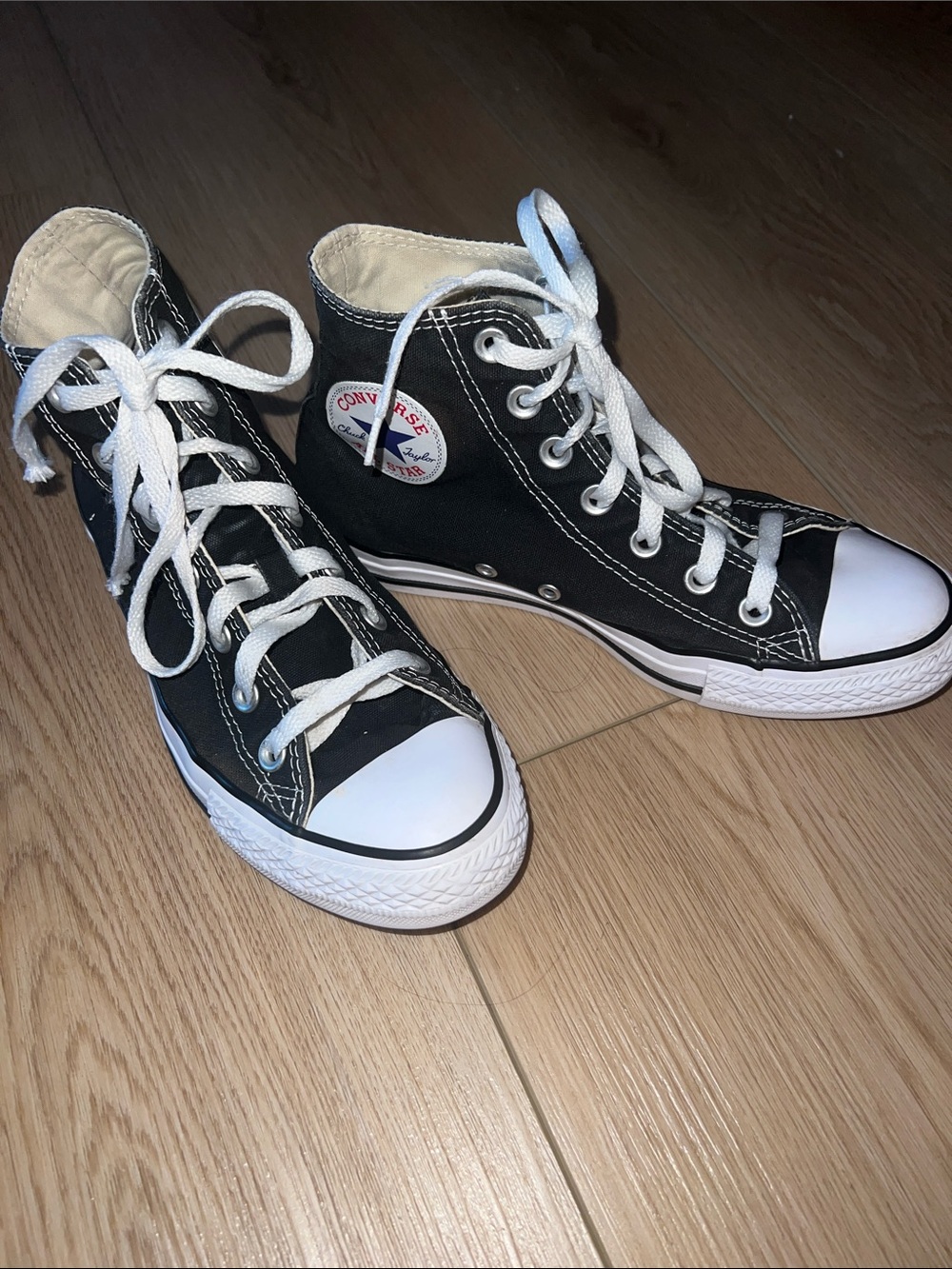 Converse Black and White High-Top Sneakers